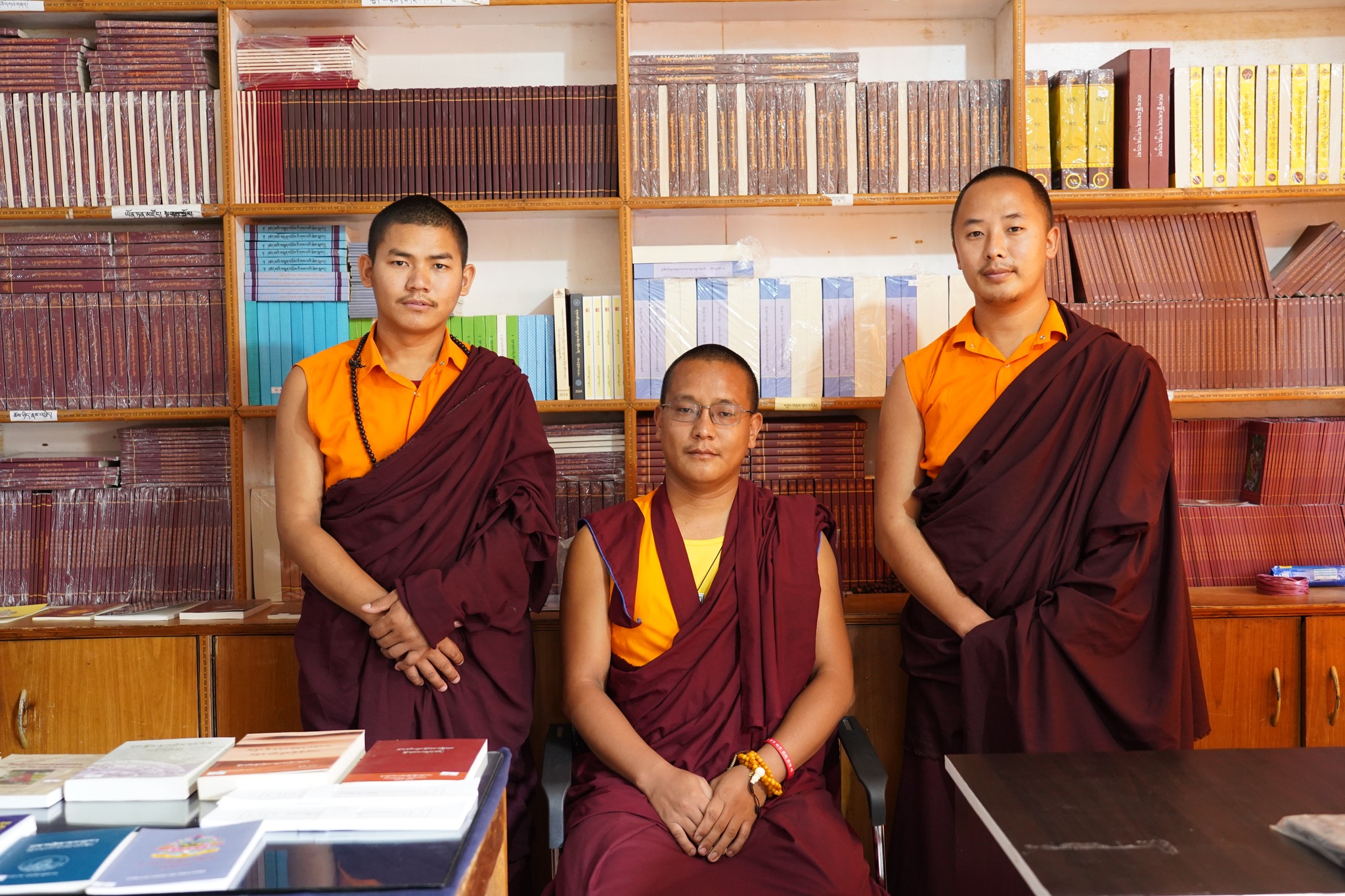 Lopen Dawa Sherpa serves as the Book Stall In-Charge, supported by team members